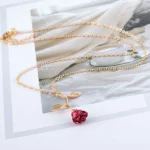collier boho pendentif rose